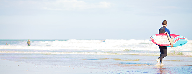 LISA-Sprachreisen-Englisch-Bournemouth-Park-Strand-Surfer-Wellen-Meer